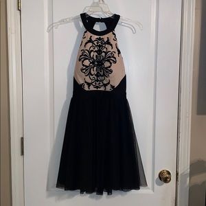 black and nude short dress